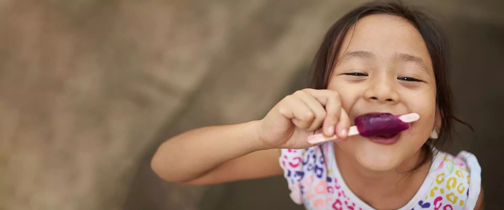 Girl enjoying ice pop